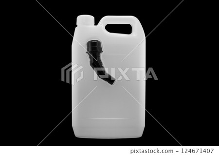 Windshield washer fluid canister isolated on black background. Antifreeze for car screen wash. Blank canister of car product isolated on white 124671407