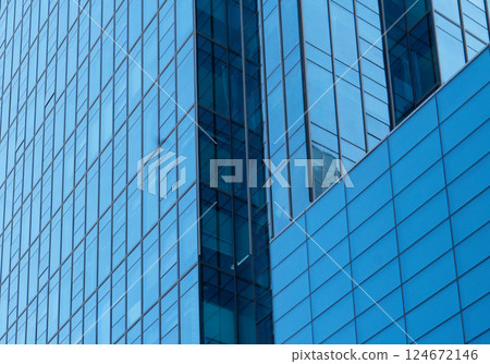 Modern office buildings in the financial district. Office buildings. glass buildings background. Windows of Skyscraper. Business Office. Corporate building Modern office buildings in the financial district. Office buildings. glass buildings background. Windows of Skyscraper. Business Office. Corporate building 124672146