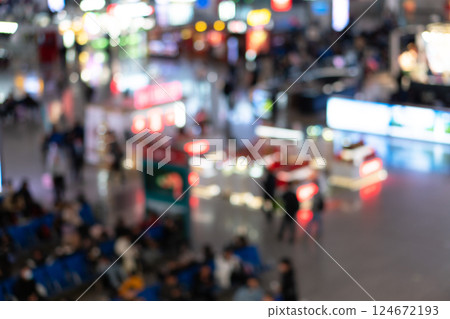 Blur background. Terminal Departure Check-in at airport with bokeh lights. Traveler at airport terminal blurrred background. Blur background. Terminal Departure Check-in at airport with bokeh lights. Traveler at airport terminal blurrred background. 124672193