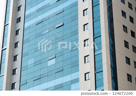 Modern office buildings in the financial district. Office buildings. glass buildings background. Windows of Skyscraper. Business Office. Corporate building 124672200