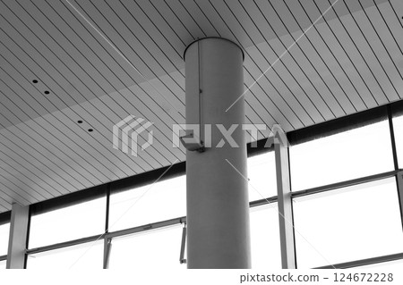 Lights and ventilation system in long line on ceiling of the industrial building. Exhibition Hall. Ceiling factory construction Lights and ventilation system in long line on ceiling of the industrial Lights and ventilation system in long line on ceiling of the industrial building. Exhibition Hall. Ceiling factory construction Lights and ventilation system in long line on ceiling of the industrial 124672228