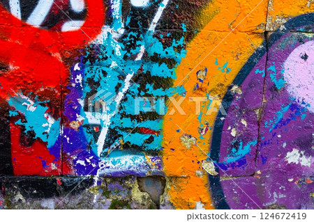 Vibrant Graffiti Wall with Bold Neon Colors for Urban 90s, Y2K Vibe 124672419