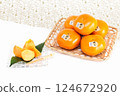 Hakata Akio, seedless, completely sweet persimmon from Fukuoka Prefecture 124672920