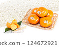 Hakata Akio, seedless, completely sweet persimmon from Fukuoka Prefecture 124672921