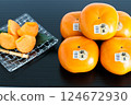 Hakata Akio, seedless, completely sweet persimmon from Fukuoka Prefecture 124672930
