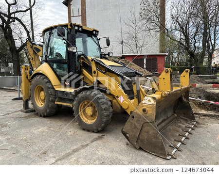 Bulldozer and excavator machinery at the road construction Bulldozer and excavator machinery at the road construction 124673044