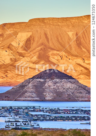 Golden Hour at Lake Mead Marina and Desert Mountains from Shoreline 124673350