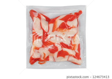 Pile of crab meat in vacuum package isolated on white background. Crab meat isolated. 124673413