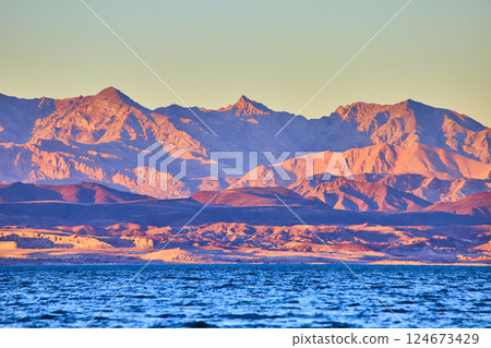 Golden Hour Reflections at Lake Mead with Mountain Vista 124673429