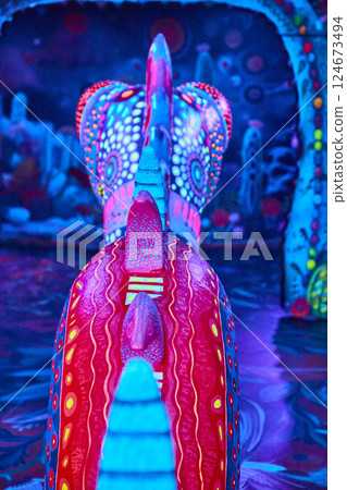 Vibrant Abstract Sculptures in Glowing Patterns Eye-Level View Vibrant Abstract Sculptures in Glowing Patterns Eye-Level View 124673494