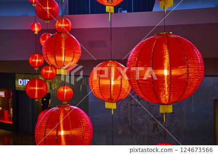 Vibrant Red Chinese Lanterns in Shopping Mall Eye-Level Perspective 124673566