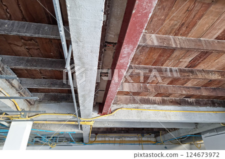Wooden roof structure of an old house Wooden roof structure of an old house 124673972