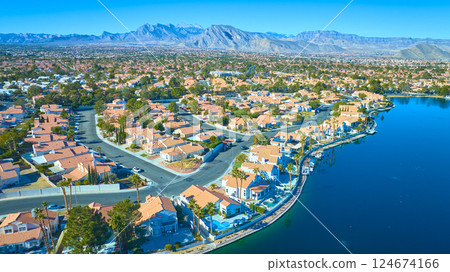 Aerial of Suburban Nevada Neighborhood with Lake and Mountains Aerial of Suburban Nevada Neighborhood with Lake and Mountains 124674166