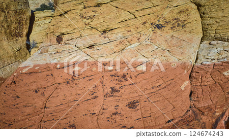 Textured Desert Rock Formation Close-Up in Daylight Textured Desert Rock Formation Close-Up in Daylight 124674243