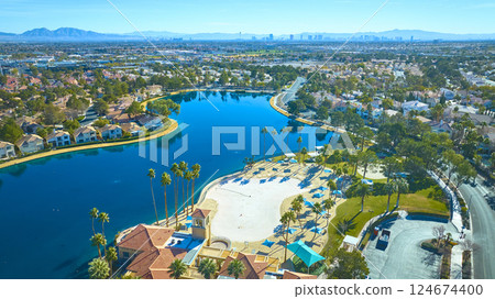 Aerial of Serene Suburban Lake Community in Desert Landscape 124674400