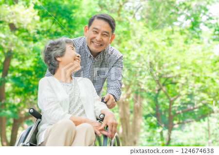 Parent and child wheelchair Parent and child wheelchair 124674638