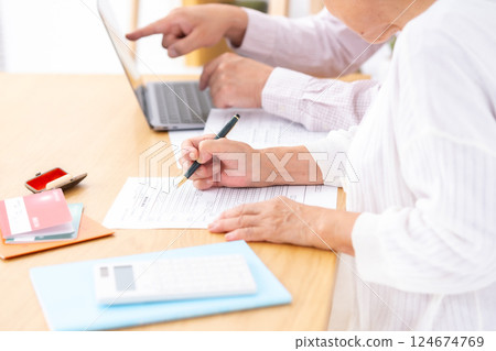 End of life planning, senior, hand 124674769