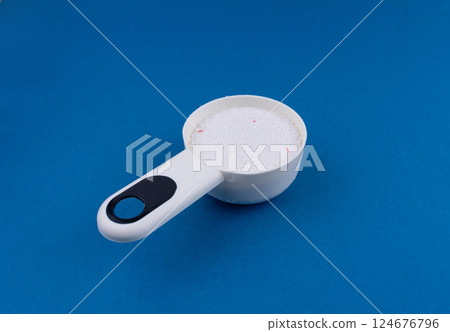 Laundry detergent pile, washing soap powder texture 124676796