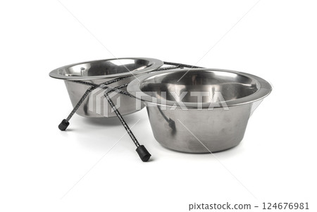 Metal pets bowl isolated, two food and water bowl set, dog food container, cat new empty dishes Metal pets bowl isolated, two food and water bowl set, dog food container, cat new empty dishes 124676981