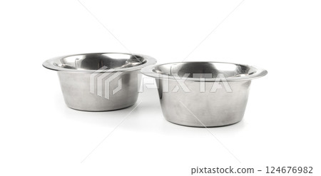 Metal pets bowl isolated, two food and water bowl set, dog food container, cat new empty dishes Metal pets bowl isolated, two food and water bowl set, dog food container, cat new empty dishes 124676982