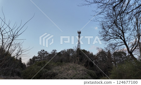Steel tower on the top of the mountain Steel tower on the top of the mountain 124677100