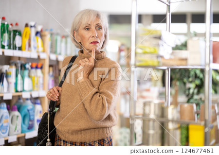 Elderly customer in a supermarket 124677461