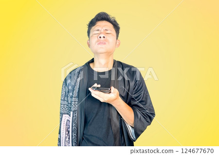 Man Frustrated with phone 124677670