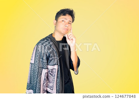 Man in Thoughtful Expression 124677848