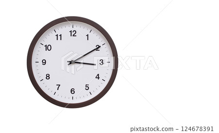A simple round wall clock with a dark brown frame and a white face displaying 03:10/15:10. Isolated on a white background, perfect for time-related concepts, deadlines, and schedule themes. 124678391