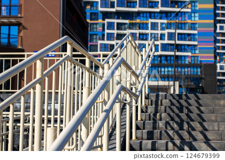 Modern Urban Stairs with a Beautiful and Colorful Background of Architectural Design Modern Urban Stairs with a Beautiful and Colorful Background of Architectural Design 124679399