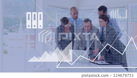 Business team analyzing documents with financial data chart image over them Business team analyzing documents with financial data chart image over them 124679731