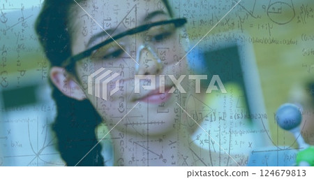 Scientific formulas and molecular structure image over person in laboratory Scientific formulas and molecular structure image over person in laboratory 124679813