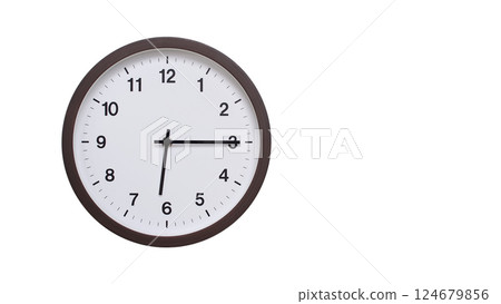 A simple round wall clock with a dark brown frame and a white face displaying 06:15/18:15. Isolated on a white background, perfect for time-related concepts, deadlines, and schedule themes. 124679856