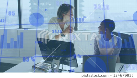 Financial data charts image over diverse business people working in office Financial data charts image over diverse business people working in office 124679935