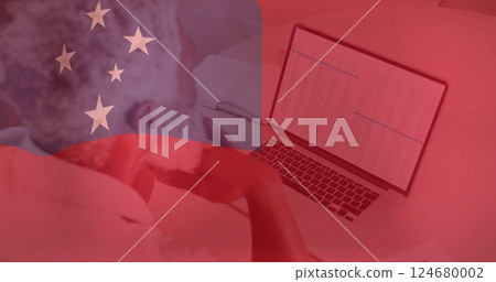 Flag of China image over person working on laptop with data Flag of China image over person working on laptop with data 124680002