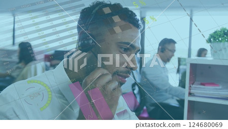 Businessman in call center with headset, pie charts and graphs image 124680069