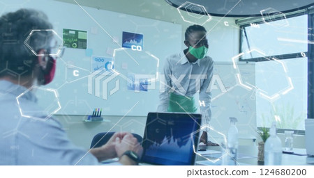 Image of chemical formula over diverse colleagues at meeting with face masks Image of chemical formula over diverse colleagues at meeting with face masks 124680200