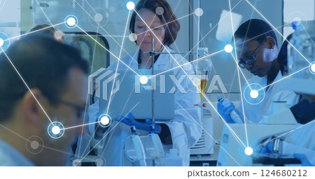 Image of network of connections over diverse scientists working in lab Image of network of connections over diverse scientists working in lab 124680212