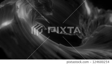 Image of glowing grey rotating wave on dark background Image of glowing grey rotating wave on dark background 124680254