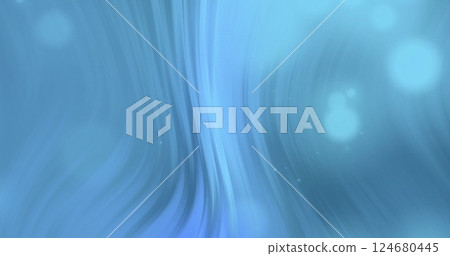 Image of light spots and trails on blue background 124680445