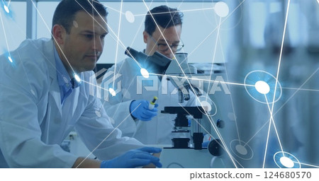 Image of scientific data processing over diverse scientists in laboratory Image of scientific data processing over diverse scientists in laboratory 124680570