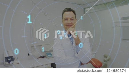 Image of data processing over caucasian male dentist Image of data processing over caucasian male dentist 124680874