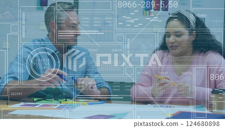 Image of data processing over diverse colleagues working in office 124680898