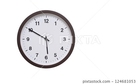 A simple round wall clock with a dark brown frame and a white face displaying 05:50/17:50. Isolated on a white background, perfect for time-related concepts, deadlines, and schedule themes. 124681053