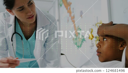 Image of cardiograph over diverse doctor and boy patient in hospital 124681496