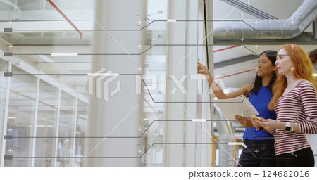 Image of financial data processing over diverse businesswomen in office 124682016