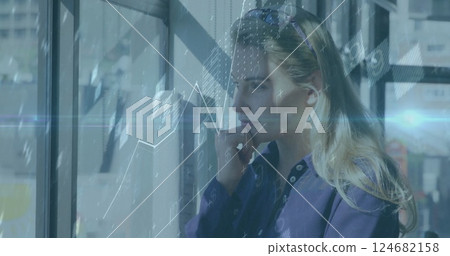 Image of financial data processing over caucasian businesswoman in office 124682158