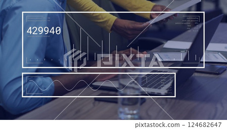 Business data analysis image over people working with documents and laptop Business data analysis image over people working with documents and laptop 124682647