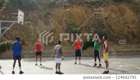 Playing basketball on outdoor court, data processing image over players 124682791