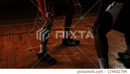 Basketball strategy image over players on wooden court Basketball strategy image over players on wooden court 124682794
